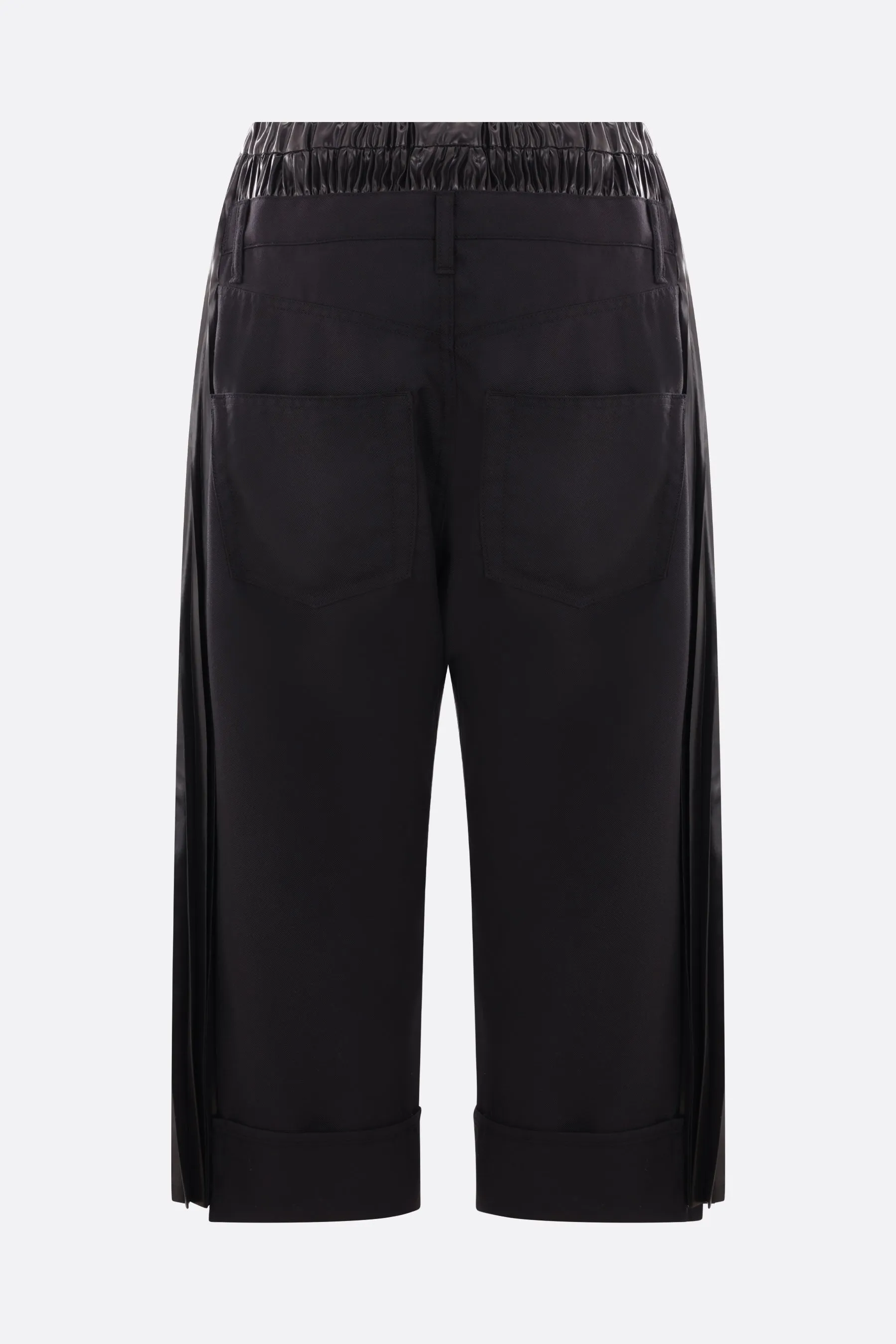 Cropped twill pants with pleated shiny nylon.