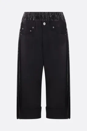 Cropped twill pants with pleated shiny nylon.