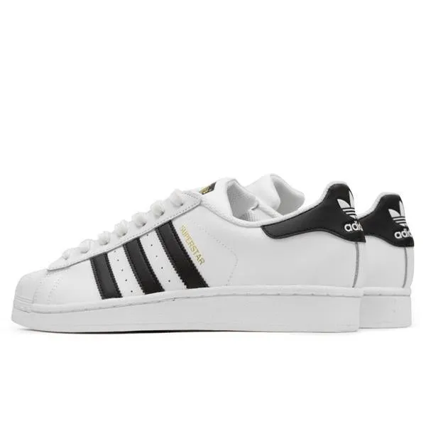 White and black women's superstar shoes Google SEO friendly.